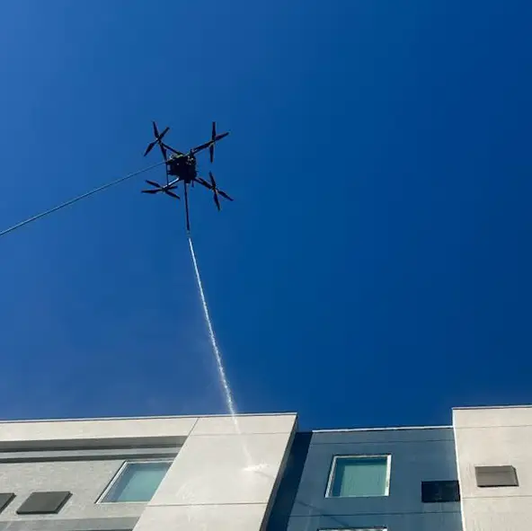 Aspira AC 4.2 cleaning high-rise cladding