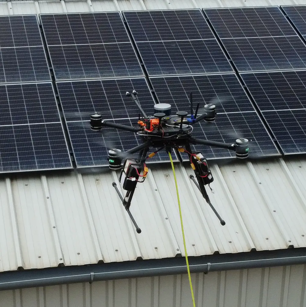 AC 4 Drone cleaning solar panels
